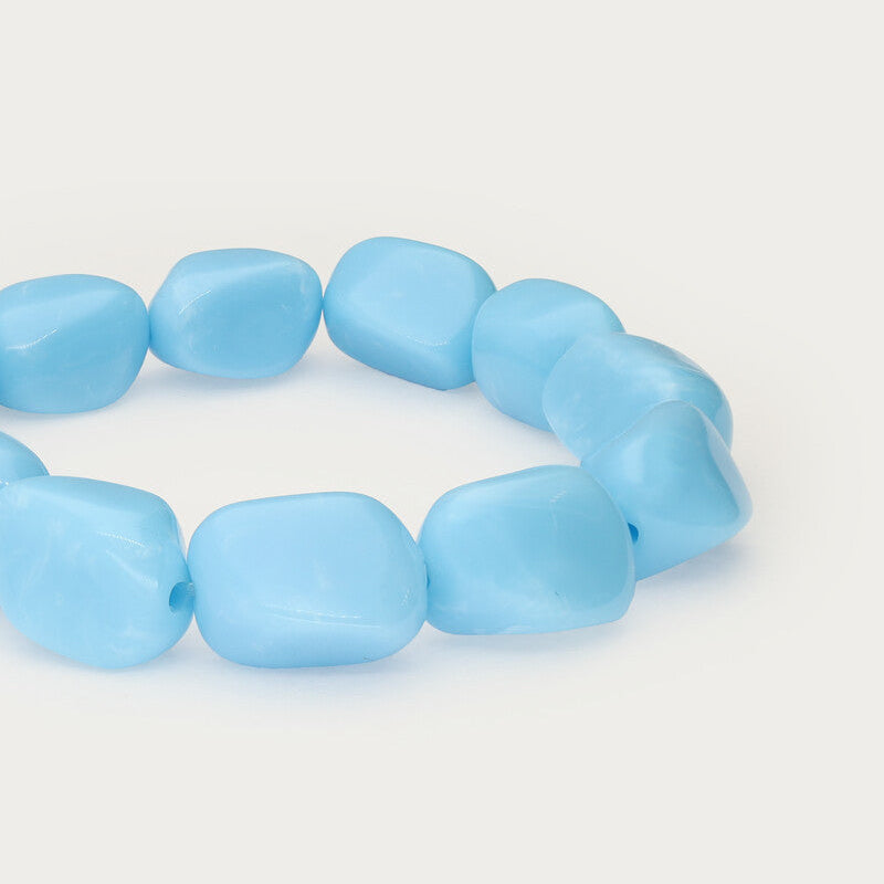 Tropical blue elastic beaded bracelet close up