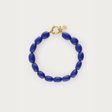 My Jewellery armbånd med petroleumsblå ovale perler og guldfarvet lukning