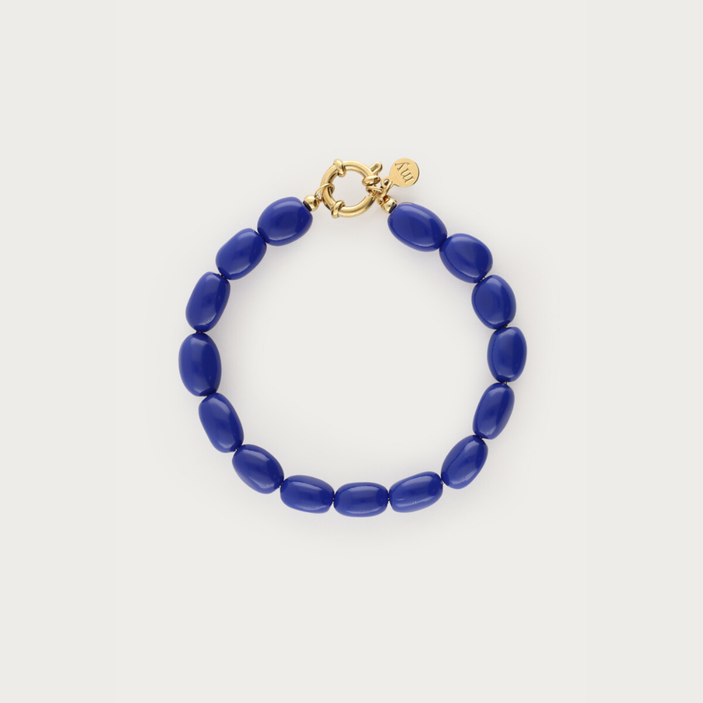 My Jewellery armbånd med petroleumsblå ovale perler og guldfarvet lukning