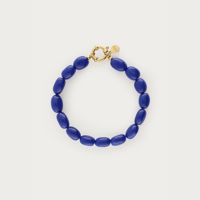 My Jewellery armbånd med petroleumsblå ovale perler og guldfarvet lukning