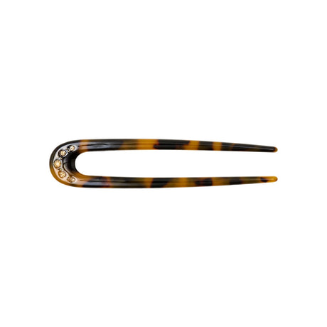 Sunny Crystal hårnål i leo-print fra Pico Copenhagen med fem dekorative krystaller.
