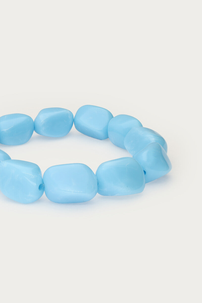 Tropical blue elastic beaded bracelet close up
