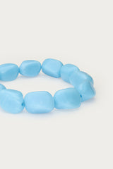 Tropical blue elastic beaded bracelet close up